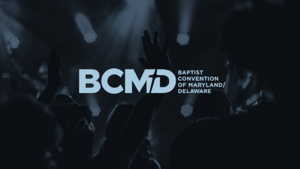 Church Worship Service in the Background with BCM/D Logo