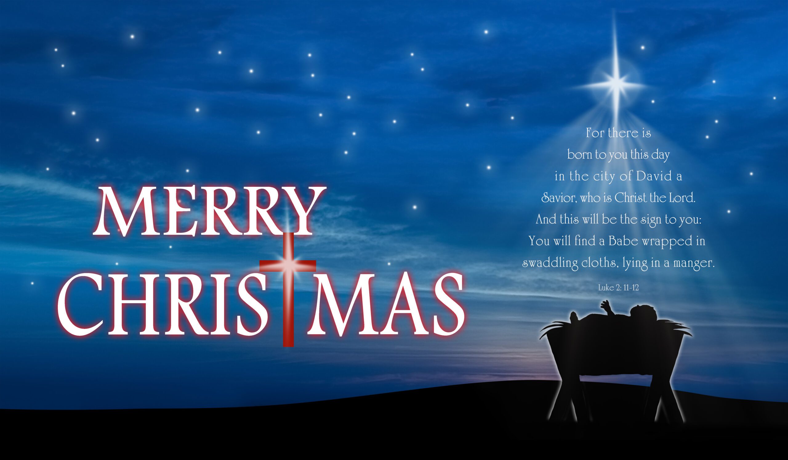 Adobe ImagesChristmas nativity scene of baby Jesus in the manger with script
