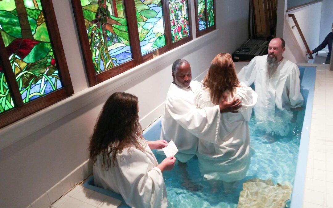 Emmanuel Church baptizes 54 in one year