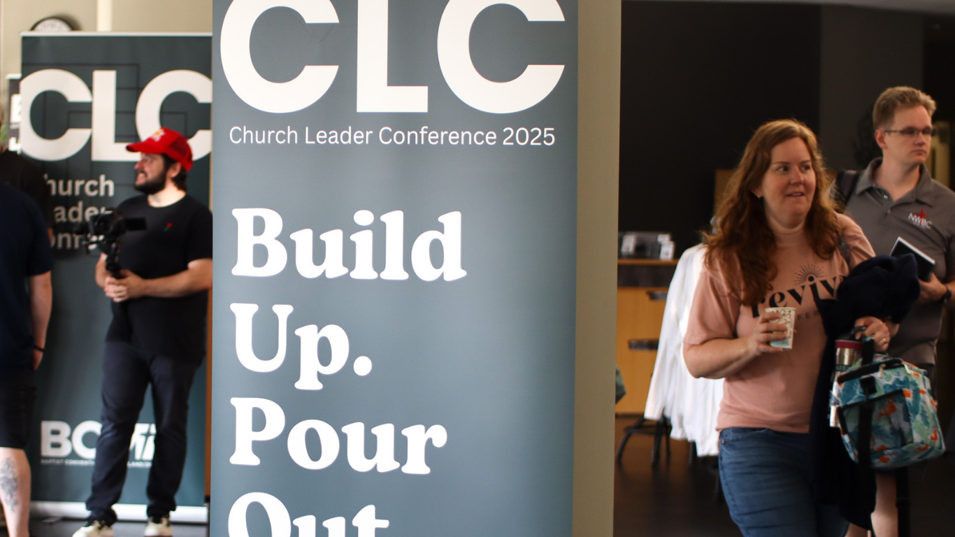 CLC for blog cover Top view of hand holding teal ribbon on dark background with copy space. Cervical and ovarian cancer, sexual assault, pcos, ptsd, anxiety disorder, agoraphobia and scleroderma awareness concept.