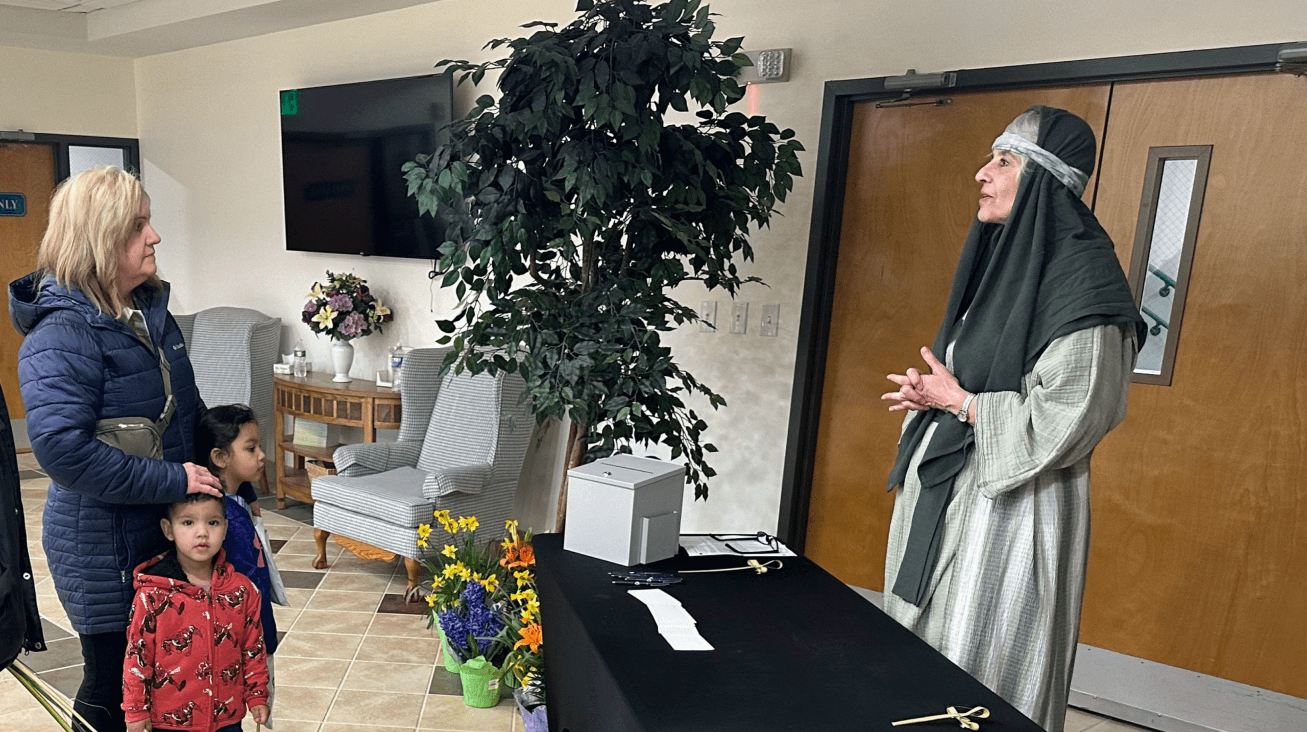 Untitled design - 2026-02-27T151707.360 Top view of hand holding teal ribbon on dark background with copy space. Cervical and ovarian cancer, sexual assault, pcos, ptsd, anxiety disorder, agoraphobia and scleroderma awareness concept.